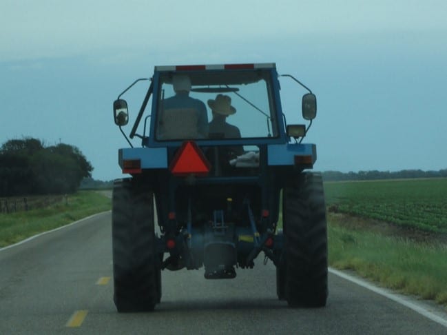 An Amish couple in Kansas, driving to town in their “car”.